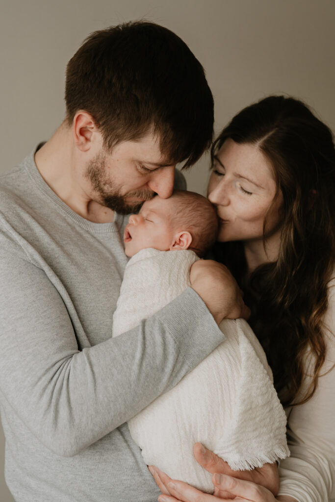 Worcester newborn photographer with family in studio