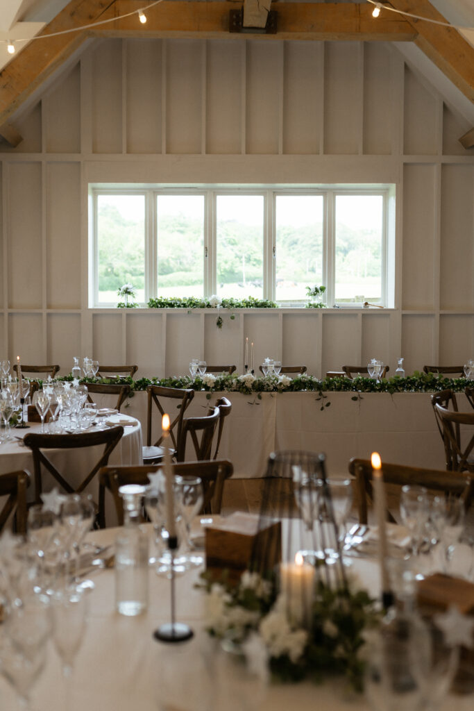 The Barn wedding reception space at hyde house by Cotswolds wedding photographer