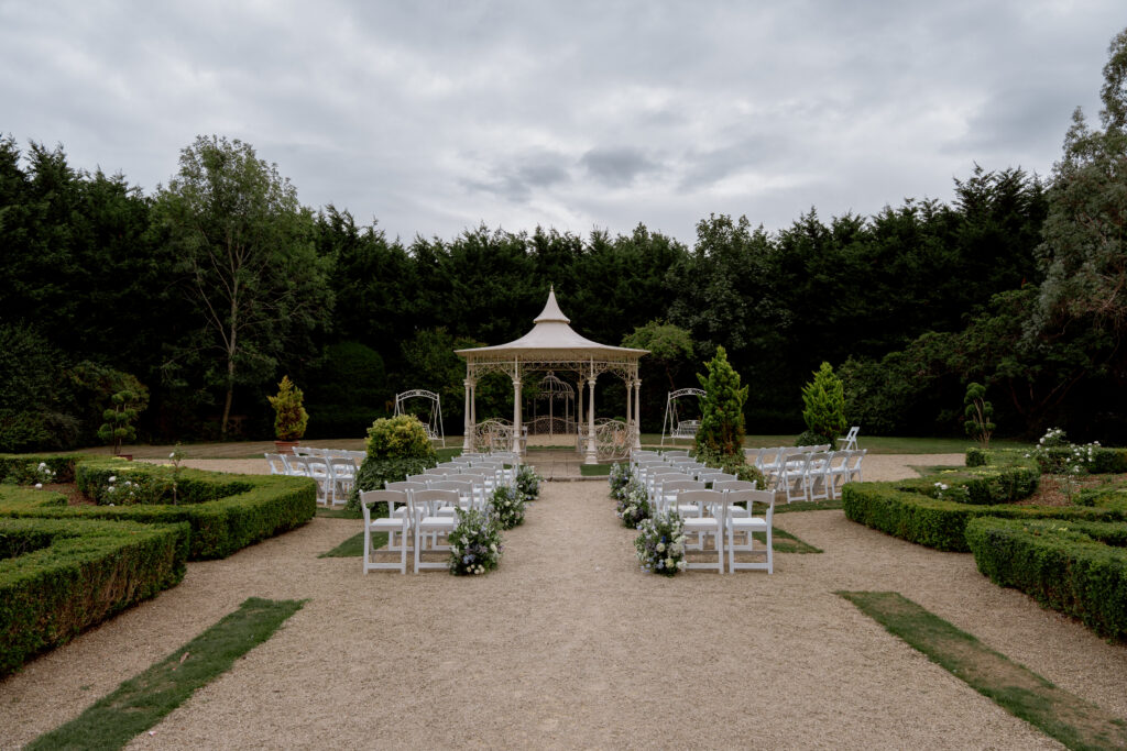 Manor by the Lake ceremony space by Cotswolds wedding photographer