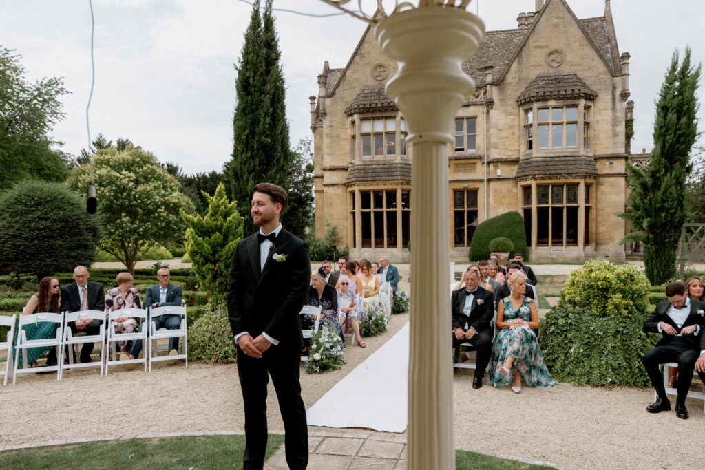 Manor by the Lake outdoor ceremony photos by Cotswolds wedding photographer