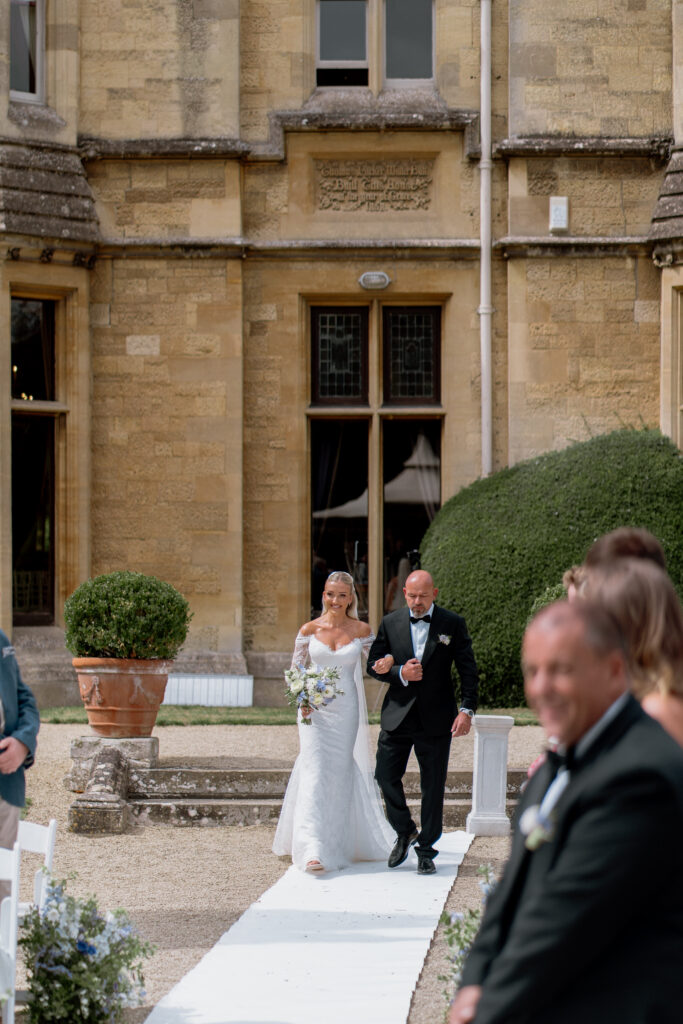 Manor by the Lake outdoor ceremony photos by Cotswolds wedding photographer