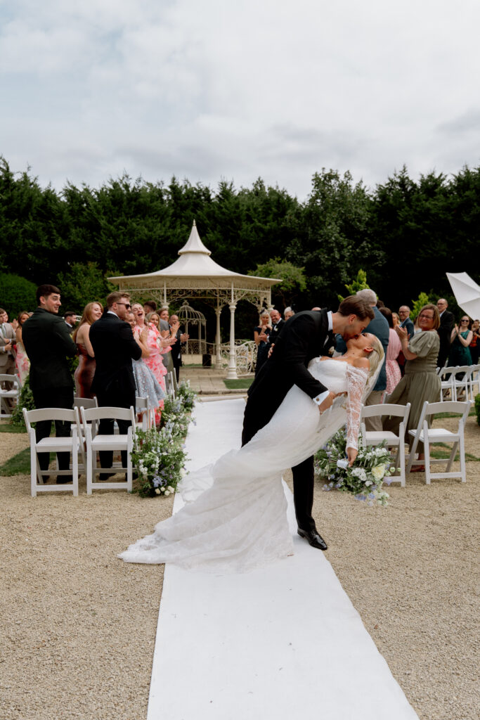 Manor by the Lake outdoor ceremony photos by Cotswolds wedding photographer