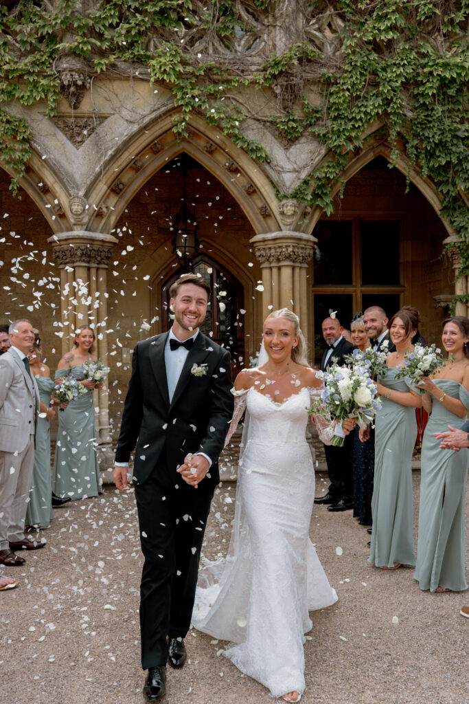 Manor by the Lake confetti by arches photo by Cotswolds wedding photographer