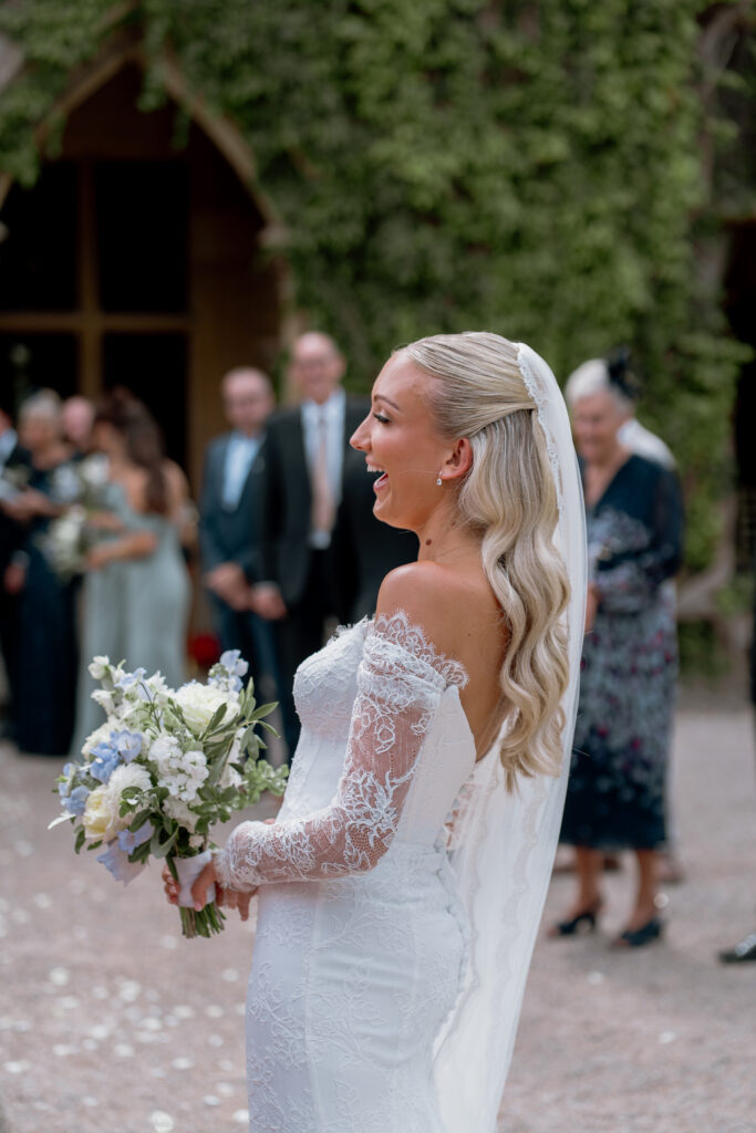 Manor by the Lake confetti by arches photo by Cotswolds wedding photographer