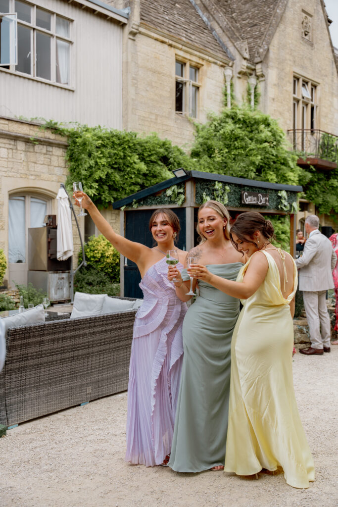 Manor by the Lake cocktail hour photos by Cotswolds wedding photographer