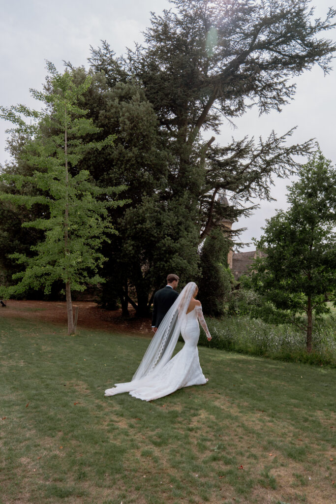 Manor by the Lake bride and groom couple photos by Cotswolds wedding photographer