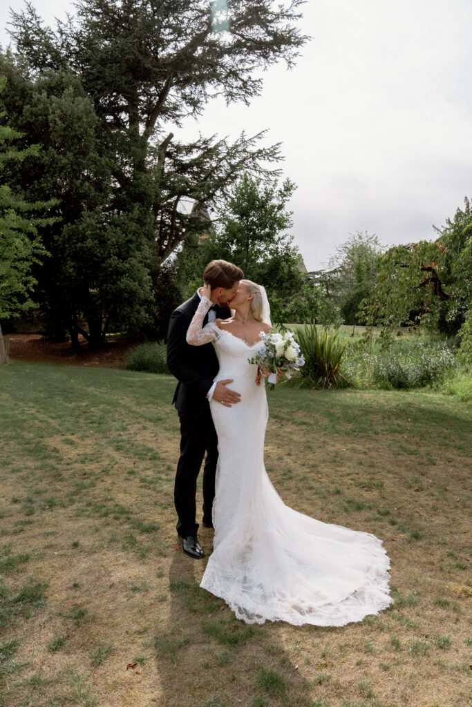 Manor by the Lake bride and groom couple photos by Cotswolds wedding photographer