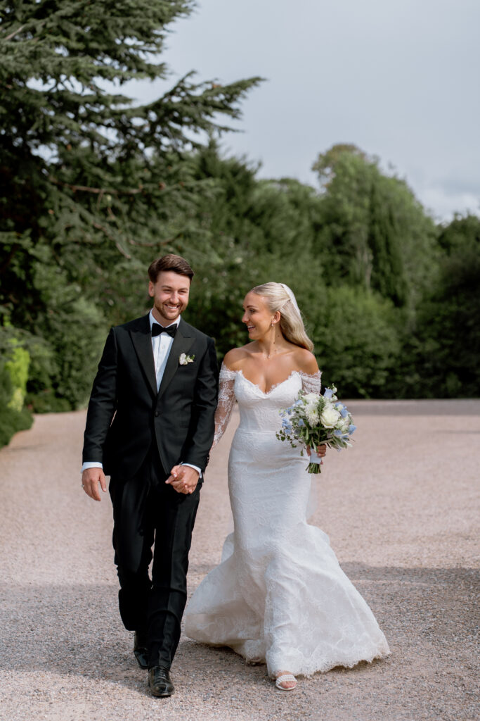 Manor by the Lake bride and groom couple photos by Cotswolds wedding photographer