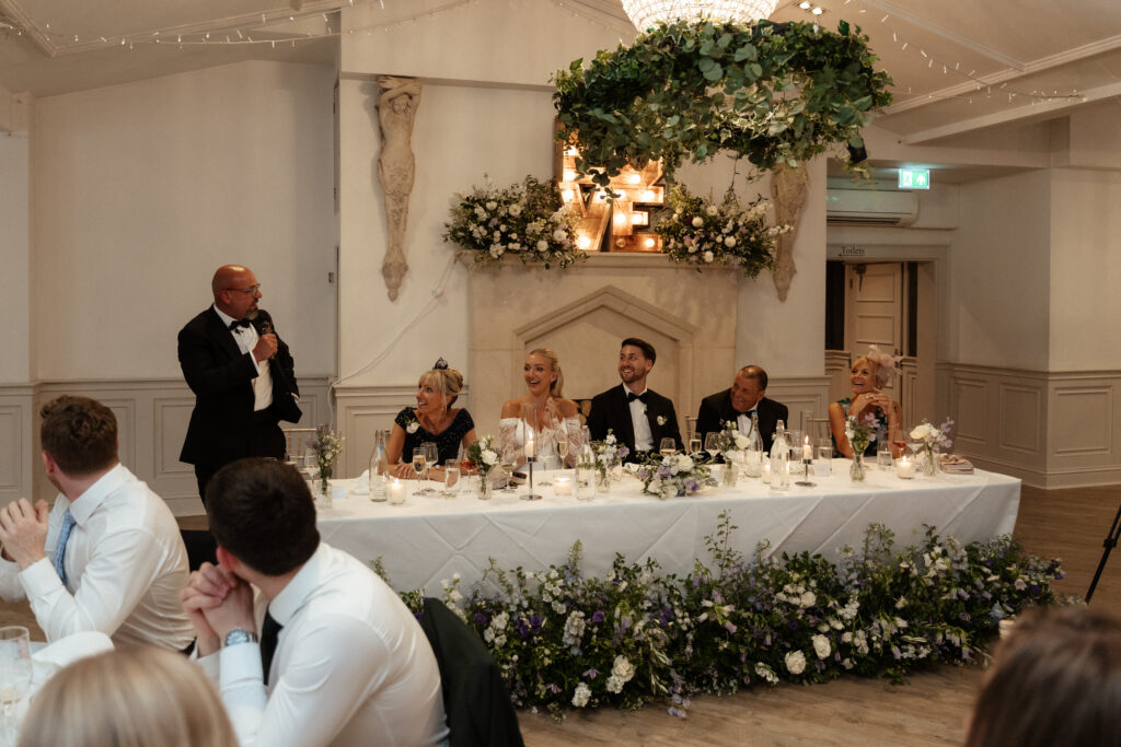 Manor by the Lake wedding speeches by Cotswolds wedding photographer