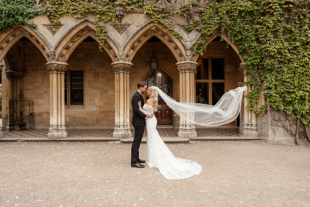 Manor by the Lake bride and groom portraits at golden hour by Cotswolds wedding photographer
