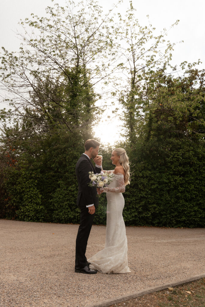 Manor by the Lake bride and groom portraits at golden hour by Cotswolds wedding photographer