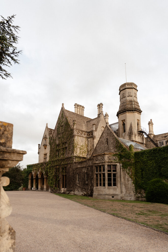 Manor by the Lake bride and groom portraits at golden hour by Cotswolds wedding photographer