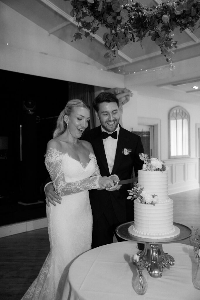 Manor by the Lake bride and groom at first dance by Cotswolds wedding photographer