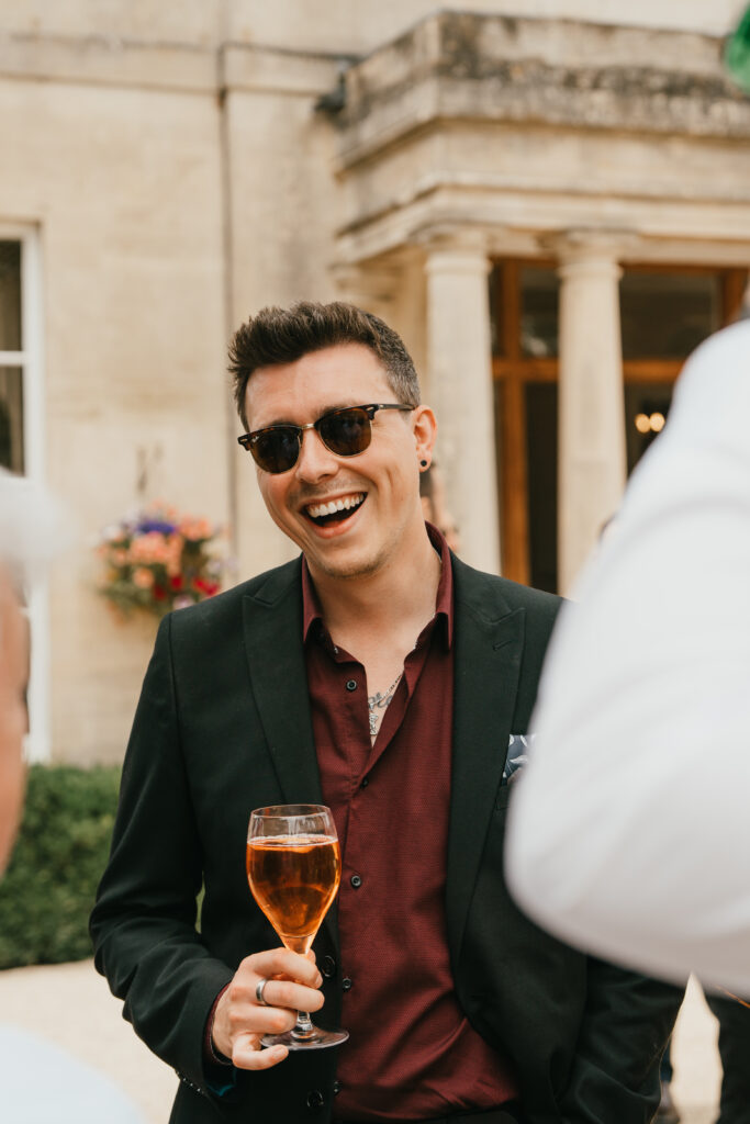 Cocktail hour at Eastington Park in Summer by Cotswolds wedding photographer