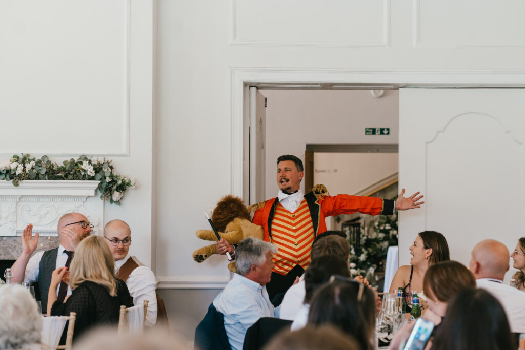 The ballroom at Eastington Park during speeches by Cotswolds wedding photographer