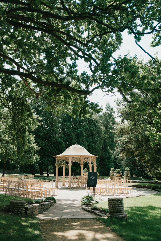 ceremony space outdoors at Eastington Park by Cotswolds wedding photographer