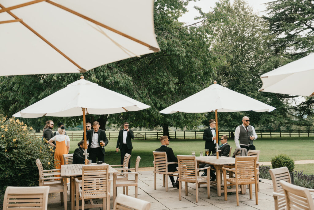 Cocktail hour at Eastington Park in Summer by Cotswolds wedding photographer