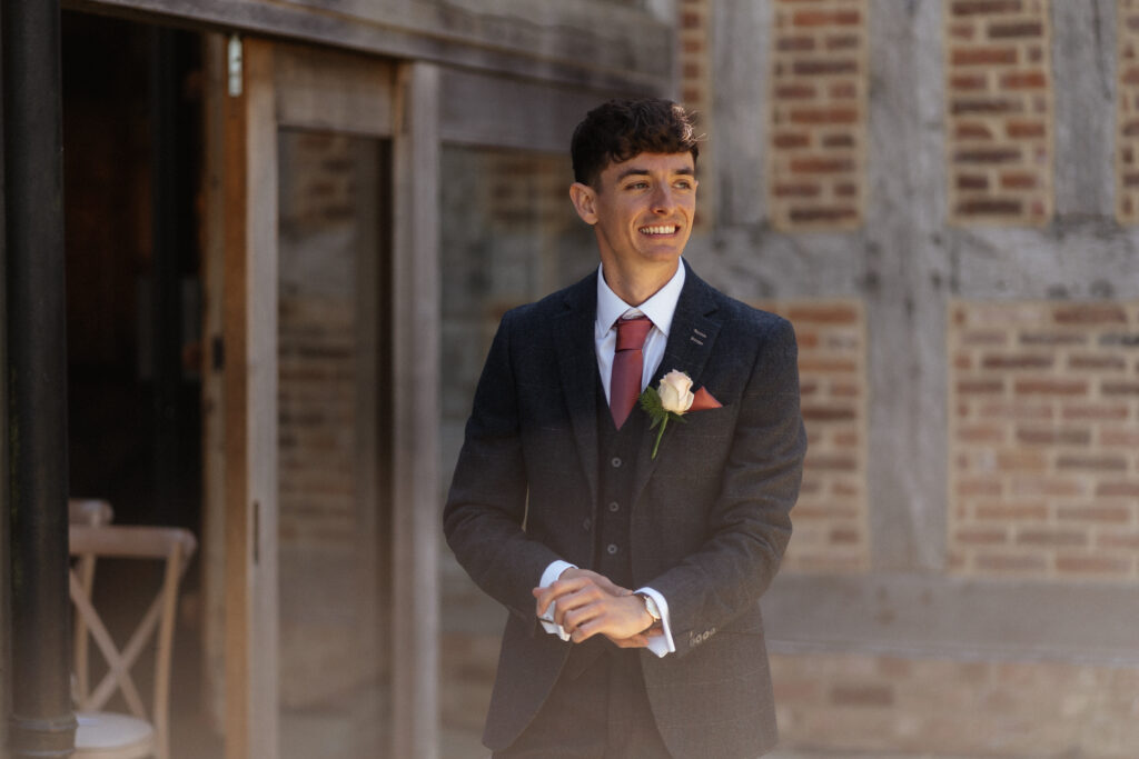 Ceremony in Threshing Barn at Barns & Yard wedding