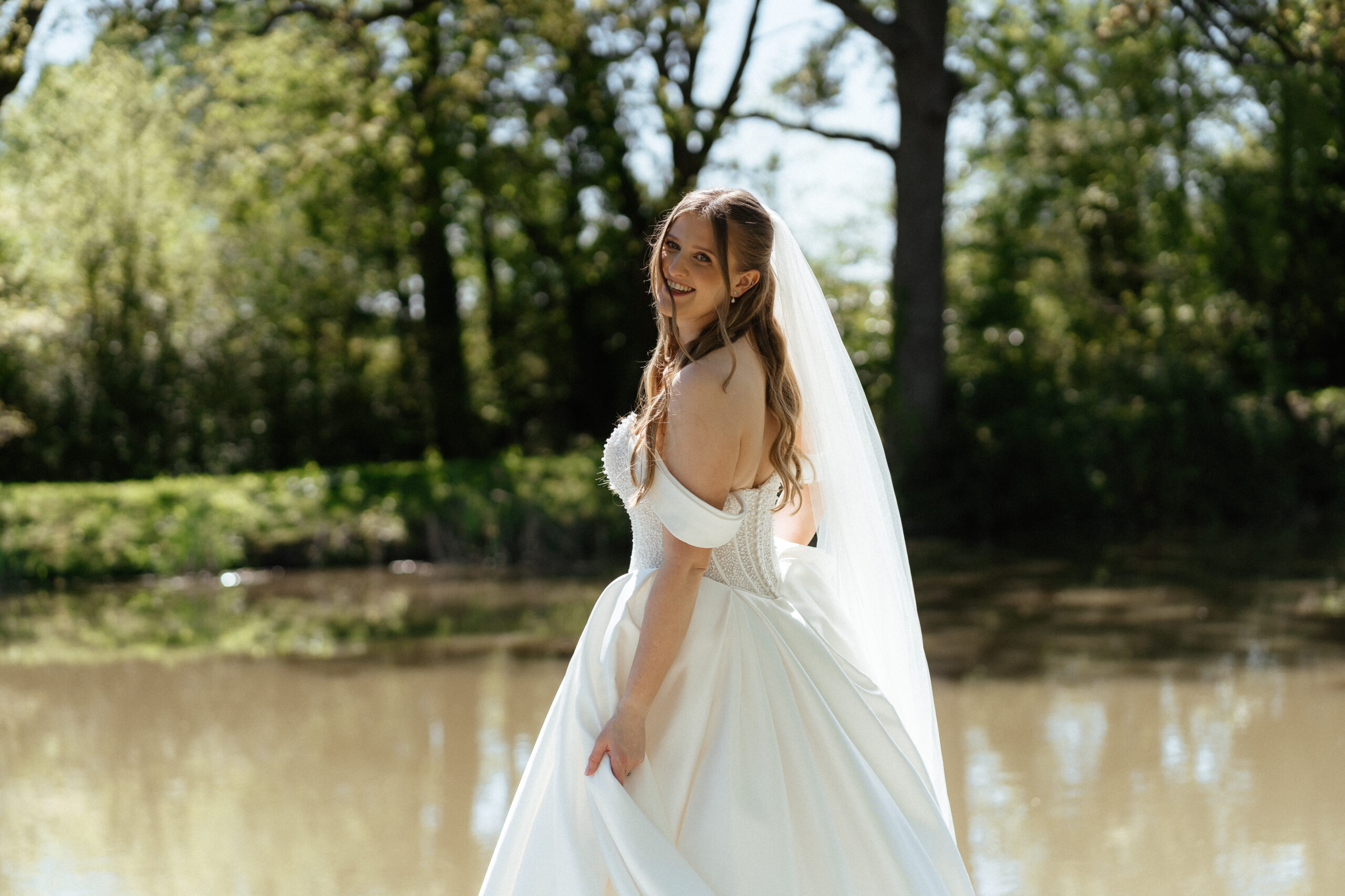 barns and yard bridal portrait at lakeside