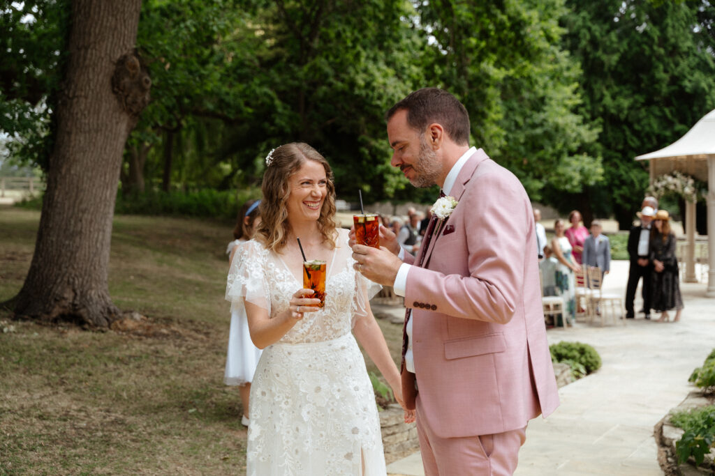 outdoor ceremony at Eastington park by Cotswolds wedding photographer