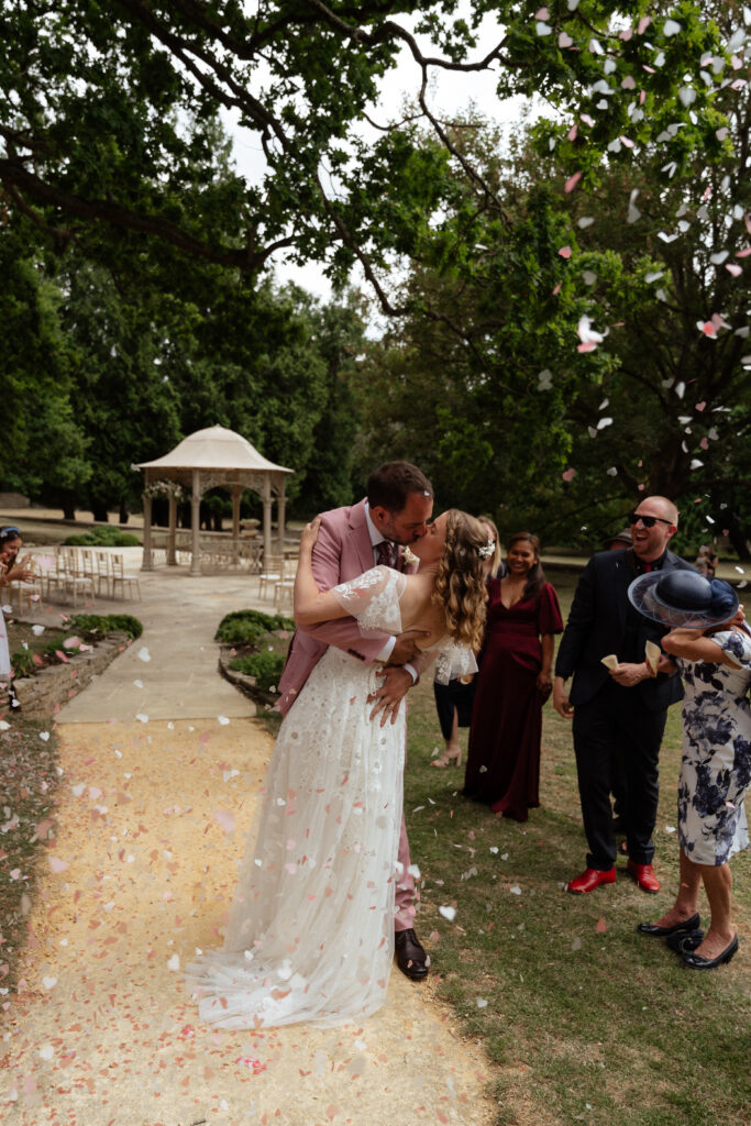 outdoor ceremony at Eastington park by Cotswolds wedding photographer