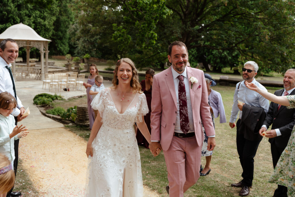 outdoor ceremony at Eastington park by Cotswolds wedding photographer