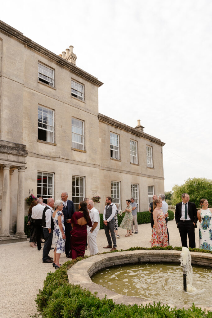 cocktail hour at Eastington park by Cotswolds wedding photographer