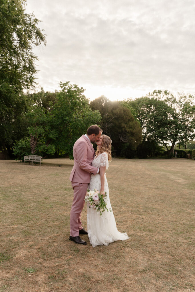 couple portraits at eastington park  by cotswolds wedding photographer