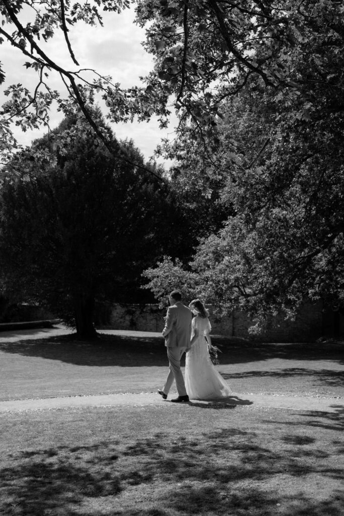 couple portraits at eastington park  by cotswolds wedding photographer