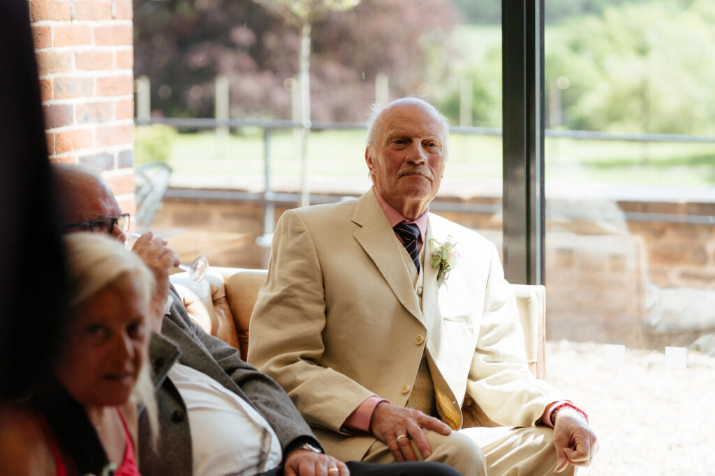 Cocktail hour candid photos at Bredenbury Court Barns by Hereford Wedding Photographer