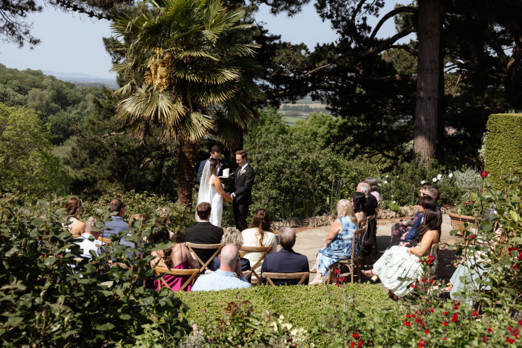 outdoor wedding ceremony at kiftsgate court gardens by cotswolds wedding photographer