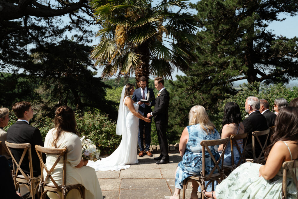 outdoor wedding ceremony at kiftsgate court gardens by cotswolds wedding photographer
