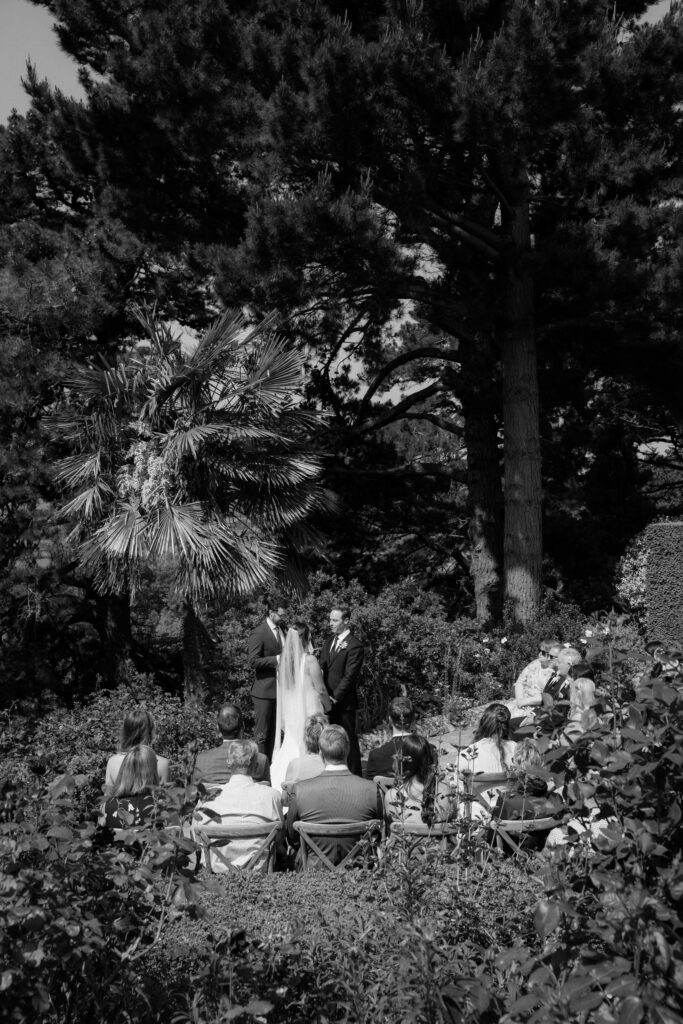 outdoor wedding ceremony at kiftsgate court gardens by cotswolds wedding photographer