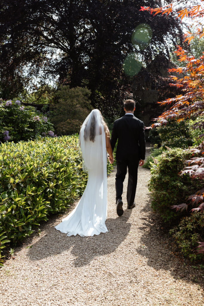 couple photos at kiftsgate court gardens by cotswolds wedding photographer