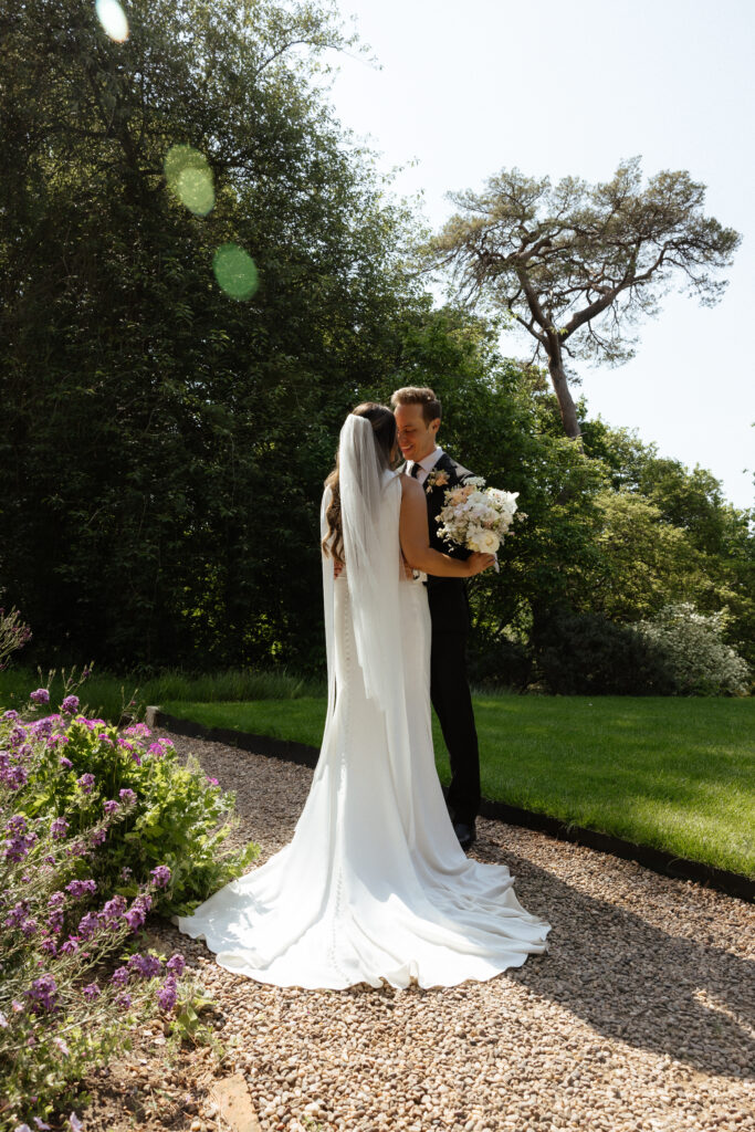 couple photos at kiftsgate court gardens by cotswolds wedding photographer