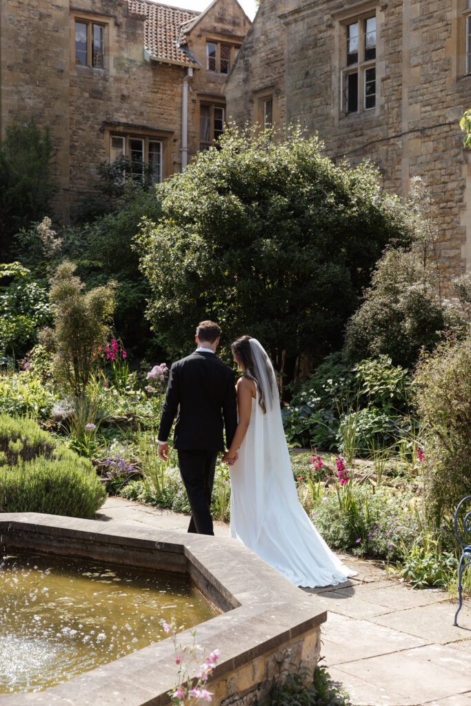 couple photos at kiftsgate court gardens by cotswolds wedding photographer