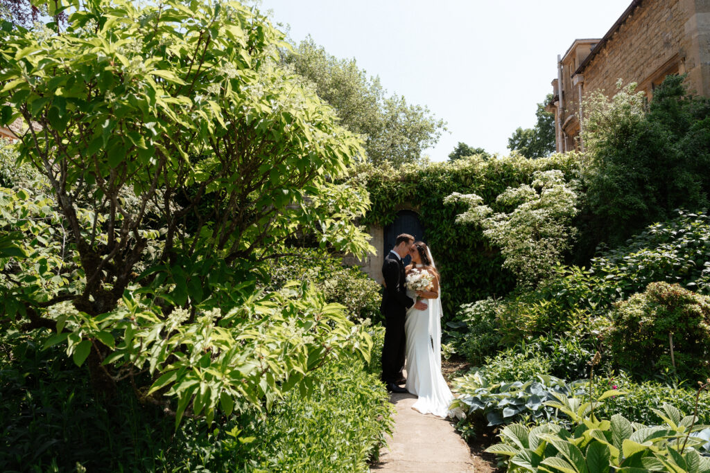 couple photos at kiftsgate court gardens by cotswolds wedding photographer