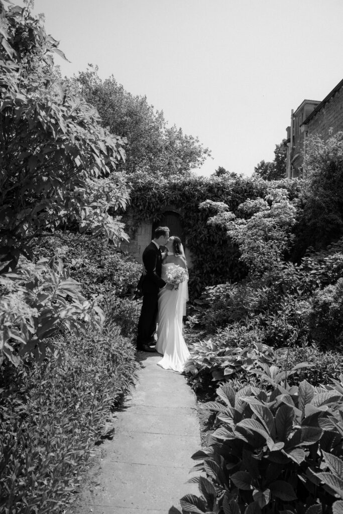 couple photos at kiftsgate court gardens by cotswolds wedding photographer