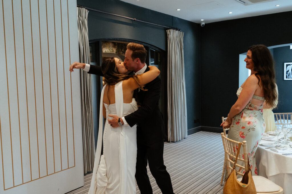 cocktail hour for wedding at manor house hotel by cotswolds wedding photographer