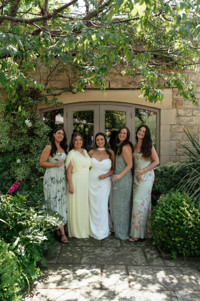 cocktail hour for wedding at manor house hotel by cotswolds wedding photographer