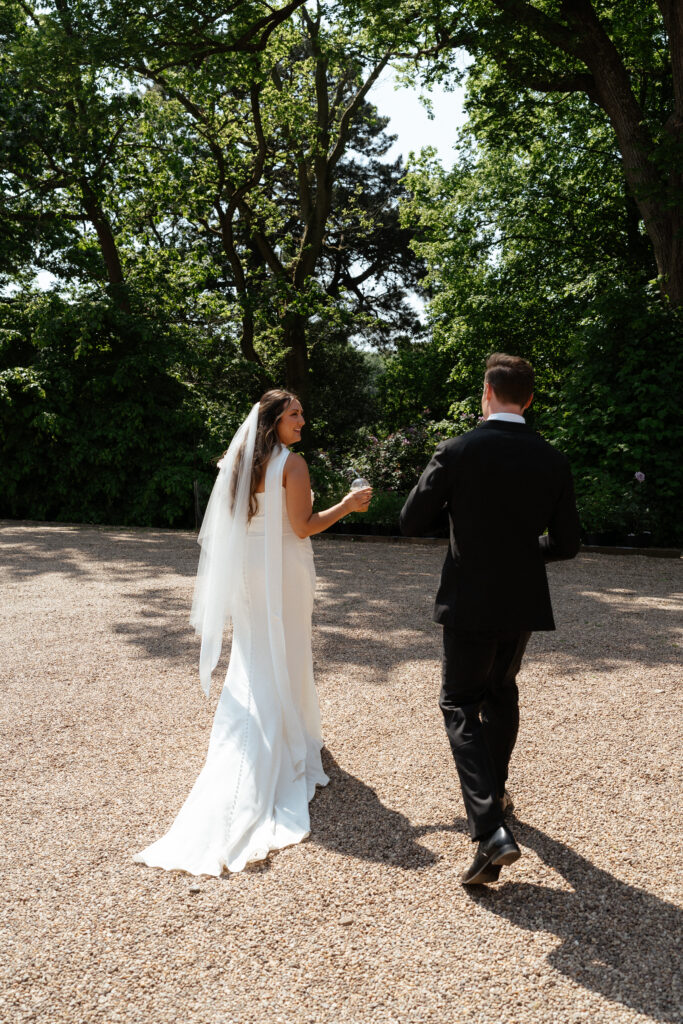 outdoor wedding ceremony at kiftsgate court gardens by cotswolds wedding photographer