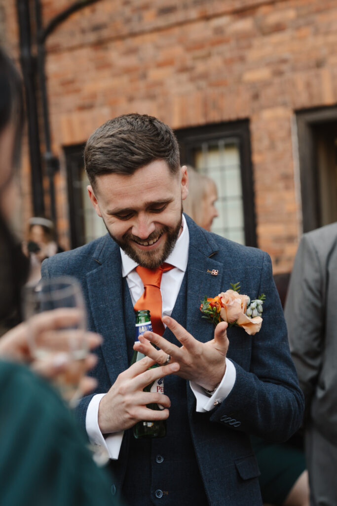outdoor ceremony under a pergola at brinsop court for autumn wedding by hereford wedding photographer