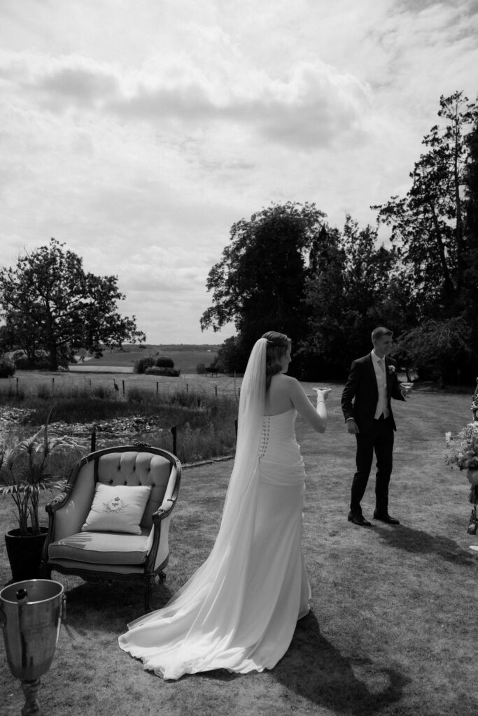 Davenport House wedding photos taken by Cotswolds wedding photographer at confetti photo moment