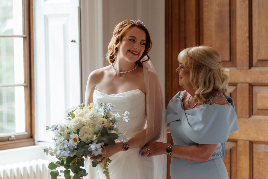 Davenport House wedding photos taken by Cotswolds wedding photographer at bridal prep in honeymoon suite.